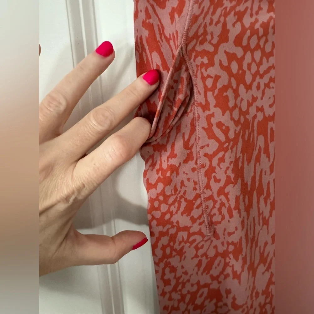 Athleta Salutation Stash Pocket II Printed 7/8 Tight Ocelot Spot Jewel Orange